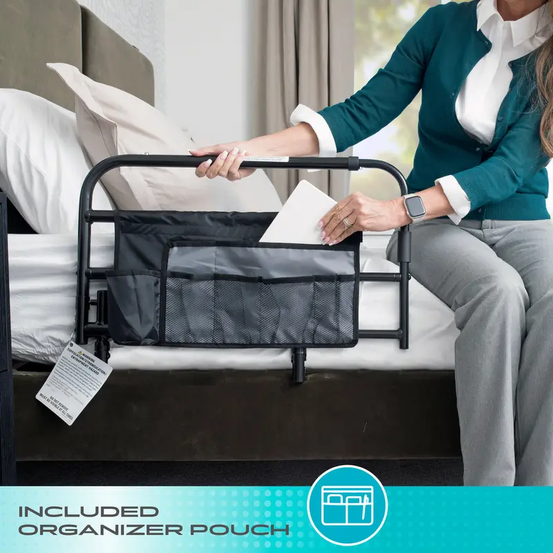 The Wonder Pivot Bed Rail's organizer pouch with pockets holding everyday bedside items